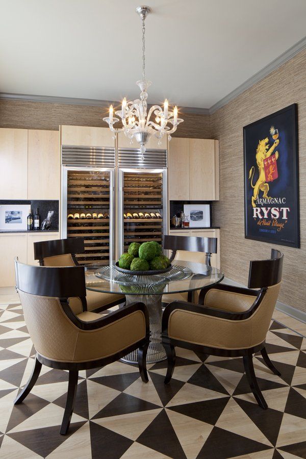 A dining room with a table and chairs and a sign on the wall that says ryst