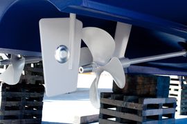 Zinc Anodes for Salt Water Use gray painted propeller and steering with zinc anodes in blue hull