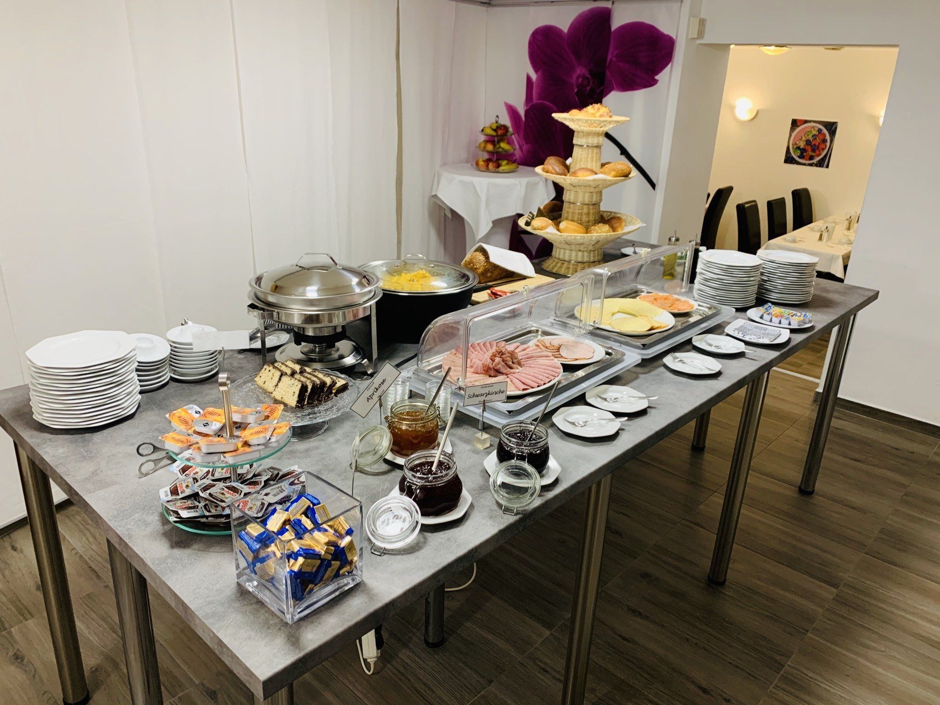 There is a buffet table with a lot of food on it.