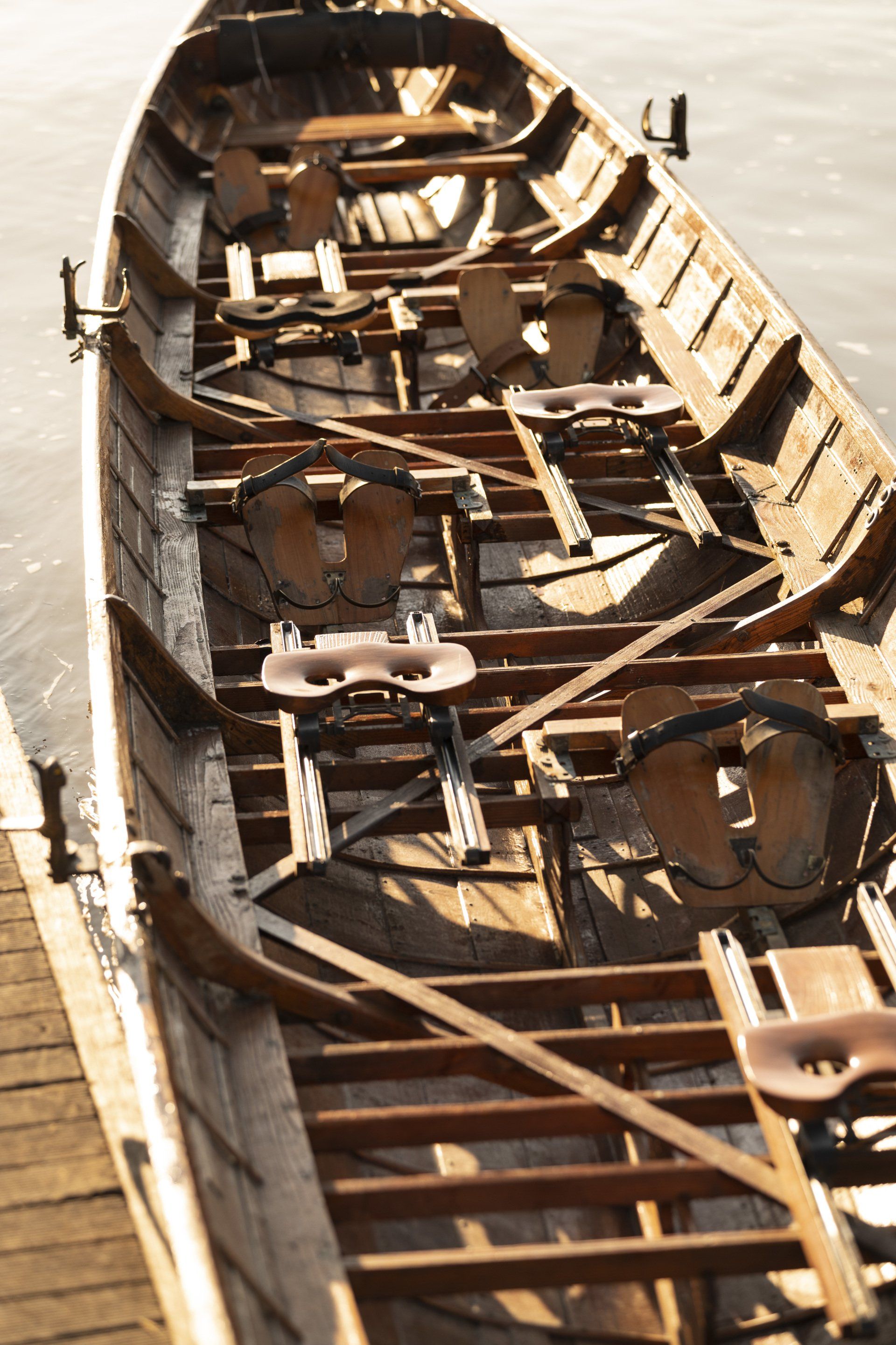 wooden canoe with oars