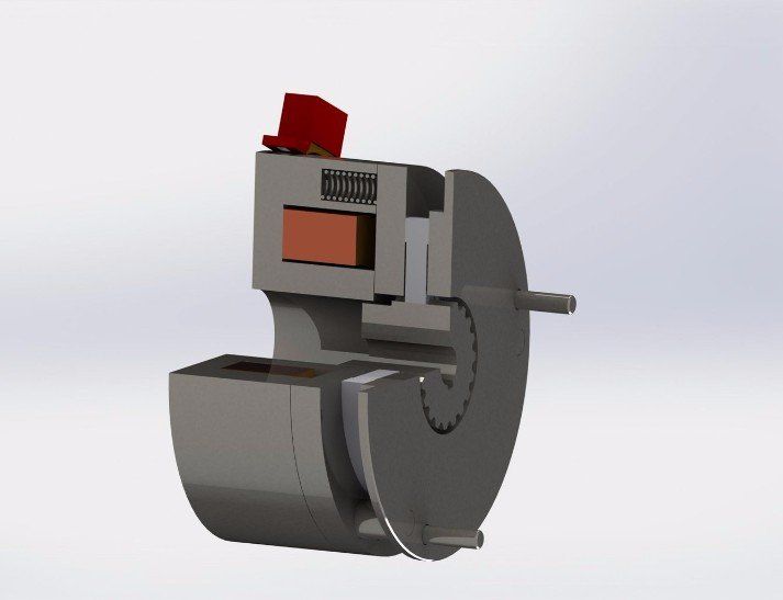 Schnittansicht eines grauen Industriegeräts mit rotierender Scheibe, die interne Komponenten.