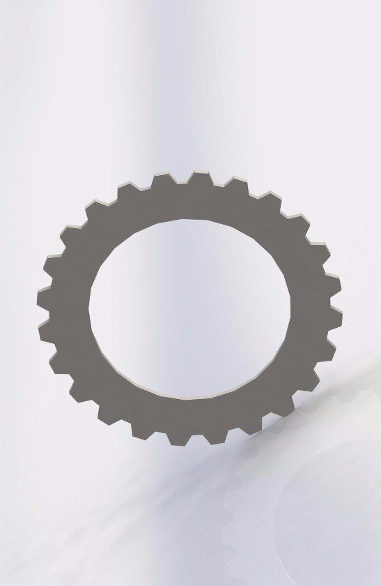 Graues rundes Zahnrad mit Zähnen.