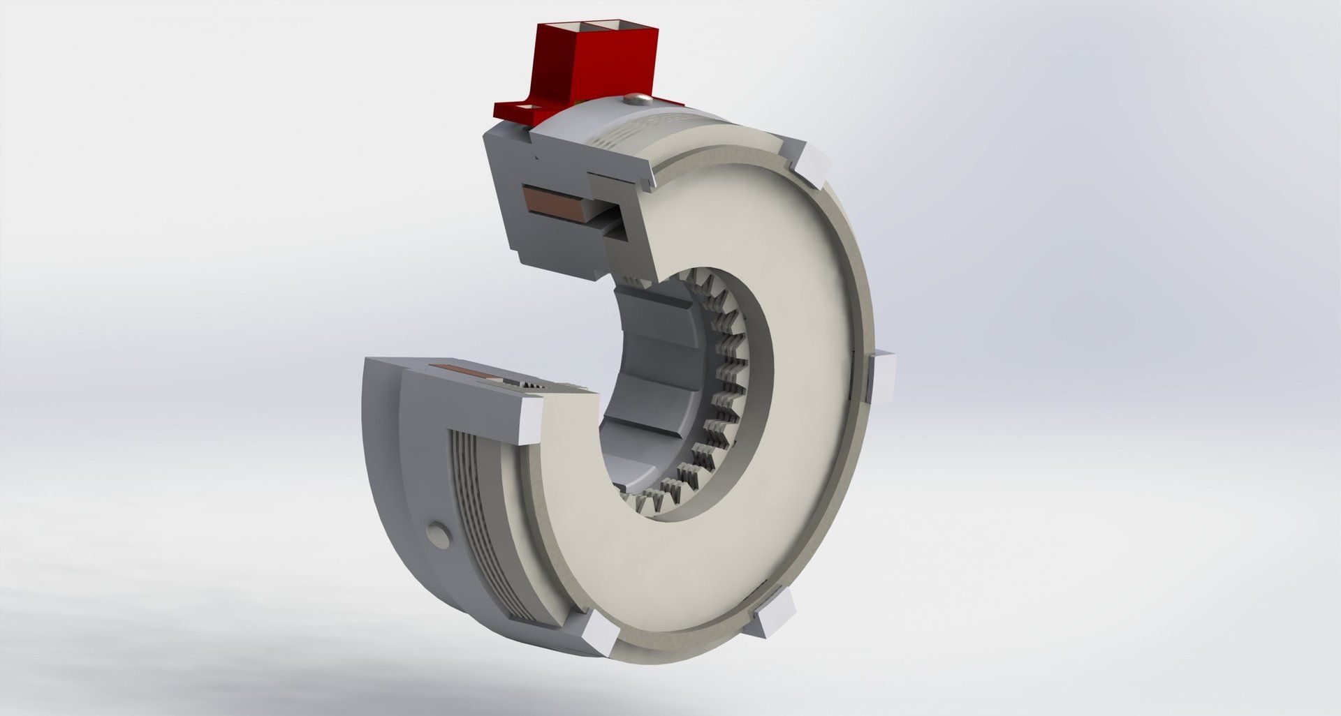 Schnittansicht einer grauen, gebogenen mechanischen Vorrichtung mit innenliegenden radialen Lamellen.