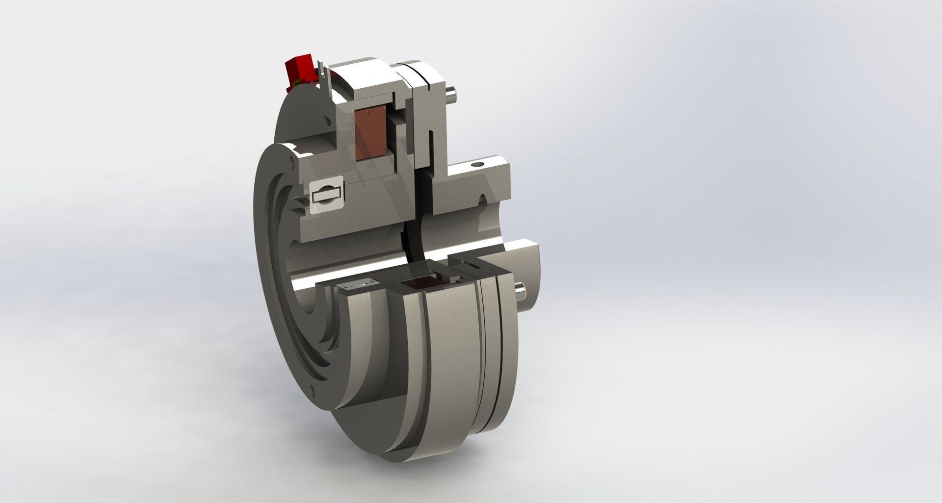 Cutaway view of a mechanical coupling device, showing internal components. Gray metal construction, red indicator.