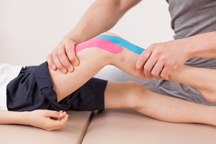 Pediatric Services — Man Lying Down and Under Therapy  Dumbell in Newport News, Virginia