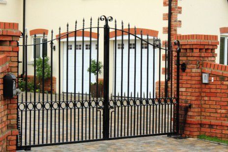 Gate to garage doors