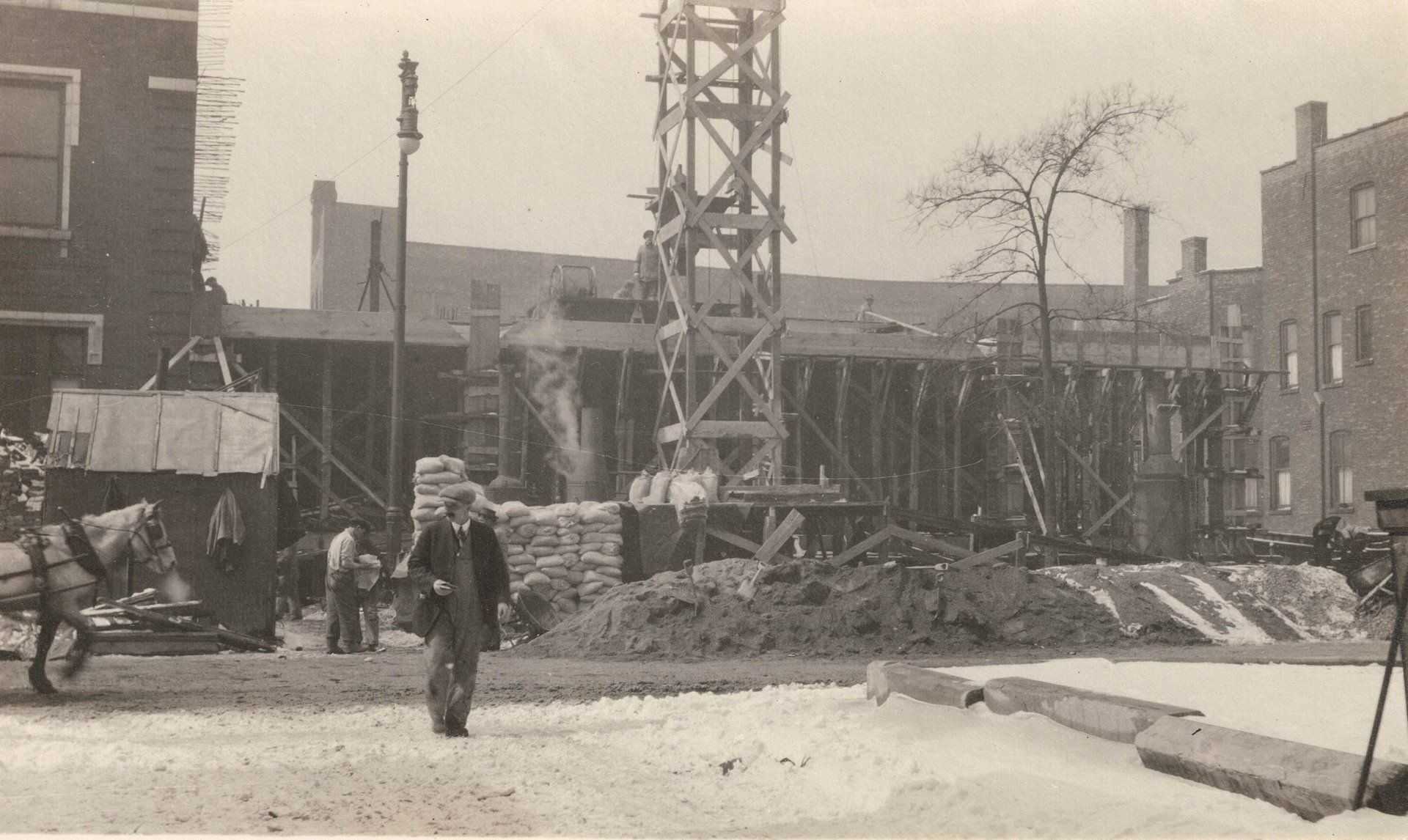 A black and white photo of a construction site