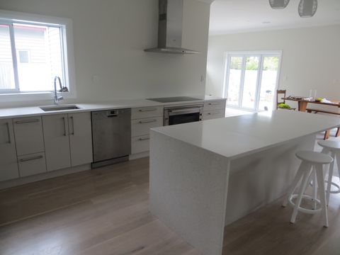 House under construction View of the kitchen with furniture