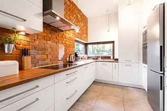 Modern Designed Kitchen with Brick — Residential Remodel in Lancaster, PA