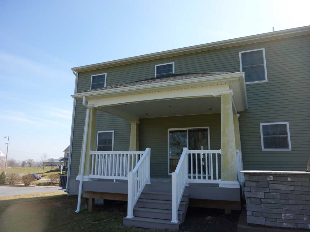 Exterior Of A House With White Fences — Residential Remodel in Lancaster, PA