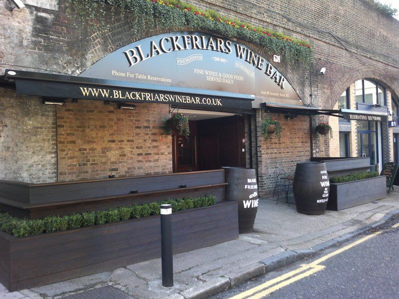 Hanging signage designed and installed for customer