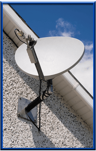 satellite dish fixed to the side of a house