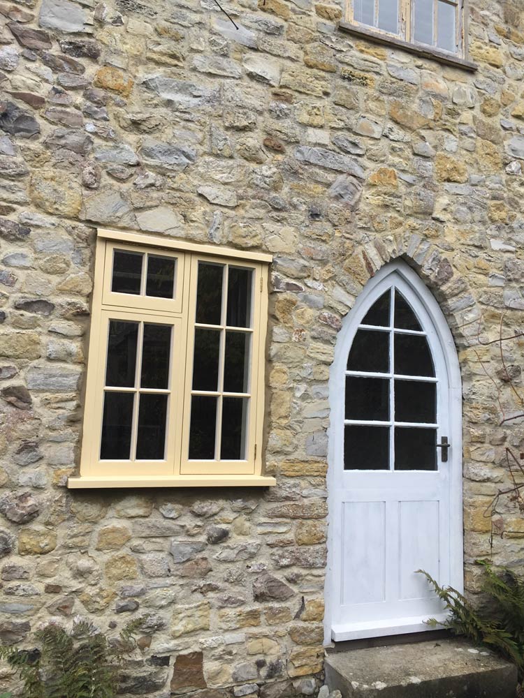 new architectural window design with handcrafted doors