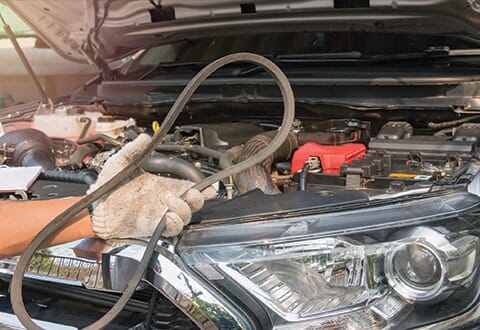 Man holding timing belt - Auto repair shop in Doylestown, PA