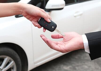 Handing car keys to new owner - Auto repair shop in Doylestown, PA