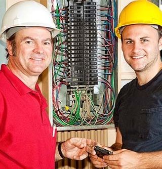 Two Electrician with Electric Panel — Electrician in Sebastian, FL Two Electrician with Electric Panel — Electrician in Sebastian, FL