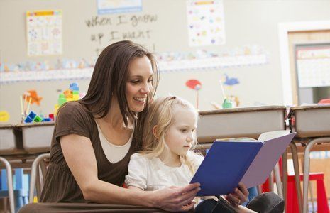 child learning with teacher 