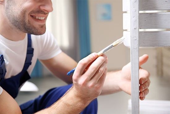 Decorator painting furniture