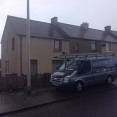 Montgomery Roofcare van outside of house