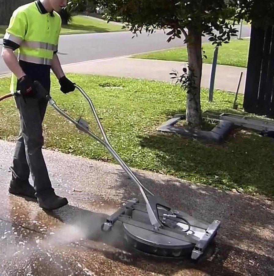 Rotary-jet concrete cleaning of mouldy concrete in preparation for the application of our mould remover treatment. 