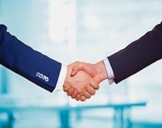 Two persons handshake — Insurance agency in Fort Walton Beach, FL Two persons handshake — Insurance agency in Fort Walton Beach, FL
