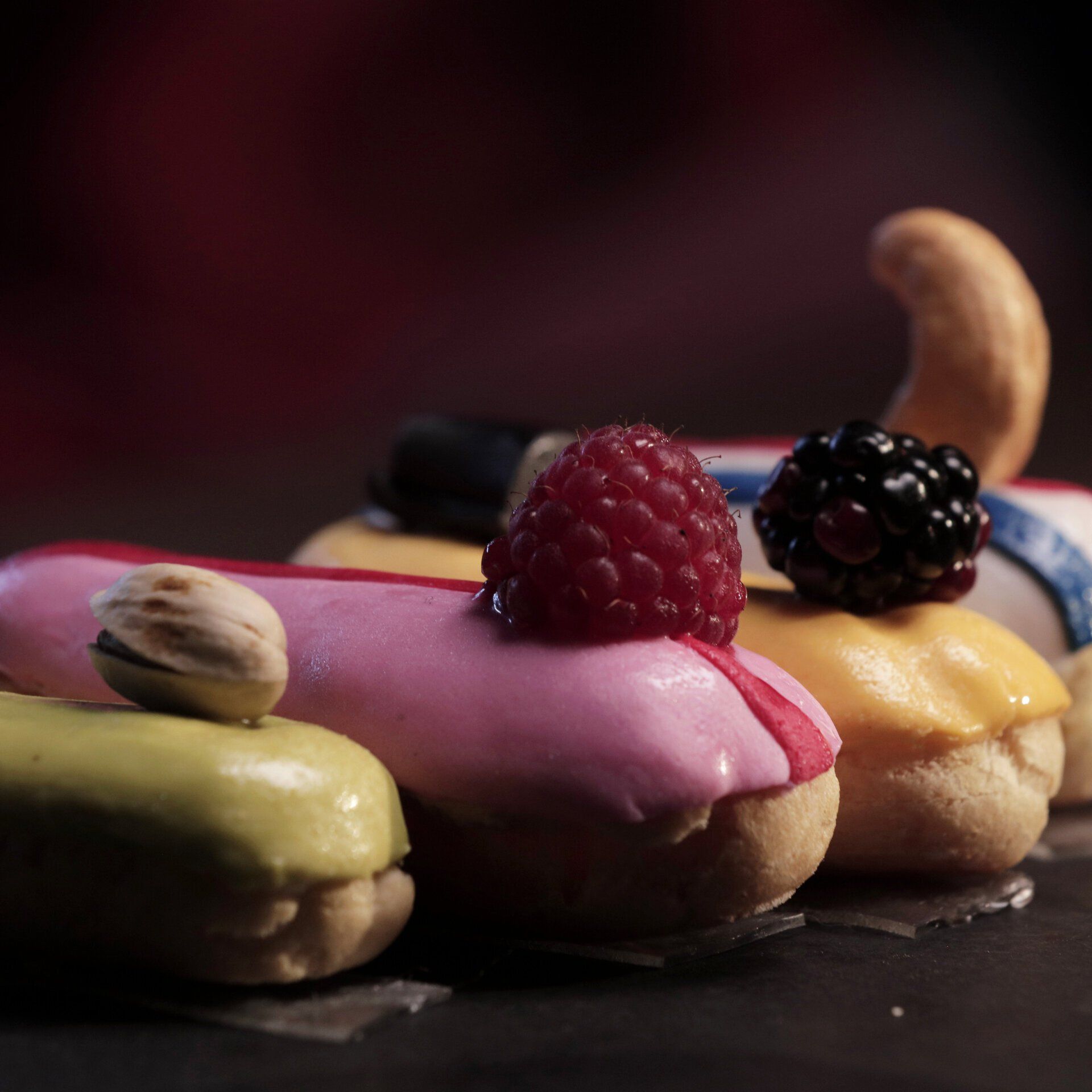 The protagonists of the Christmas Video A close up of a donut with a raspberry on top