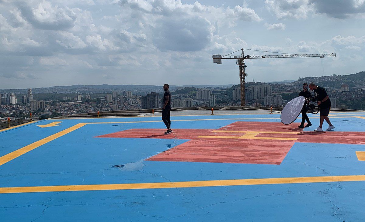 Dani Alves filming on a helipad in São Paulo