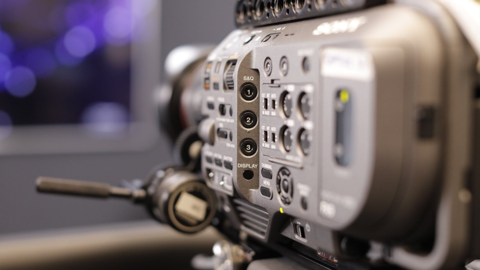 A close up of a camera with a lot of buttons on it.
