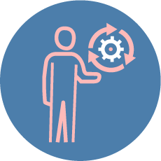 A person is standing next to a gear with arrows around it.