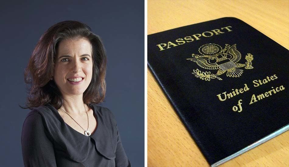 A woman is smiling next to a united states of america passport