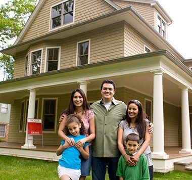Probate Administration — Family In Front Of New House in Danville, IL