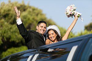 A couple using wedding limo services in Sausalito, CA A couple using wedding limo services in Sausalito, CA