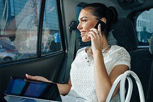 Book a Limo — Woman Inside a Limousine in San Francisco, CA Book a Limo — Woman Inside a Limousine in San Francisco, CA