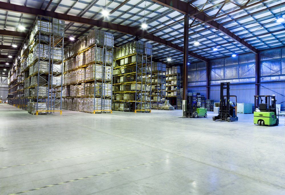 Large modern warehouse with lightings — R & M Electrical in Townsville, QLD