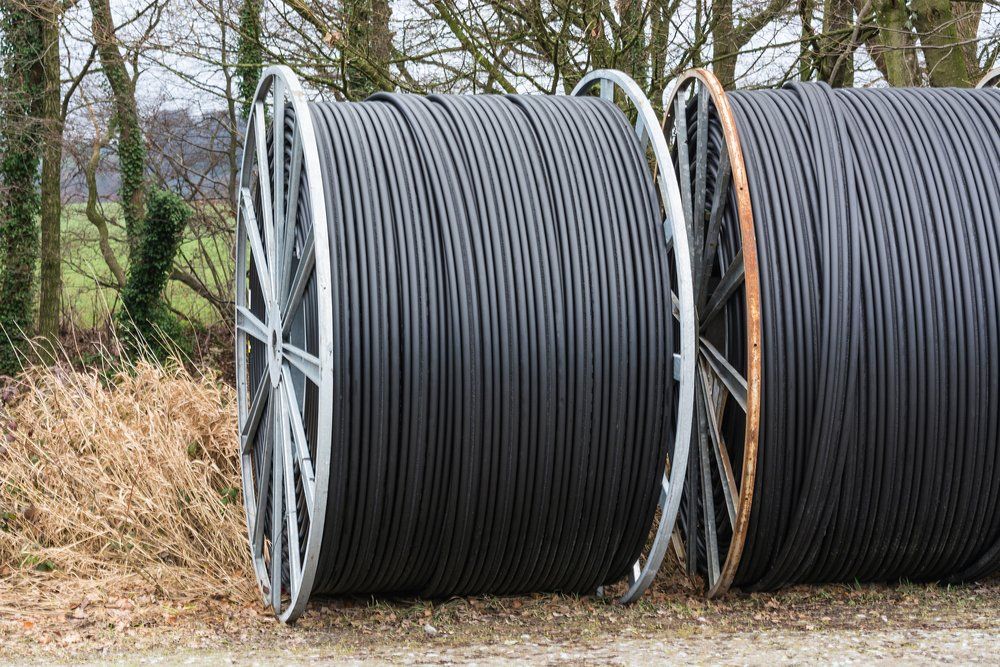 Steel roller with fiber optic cables — R & M Electrical in Townsville, QLD