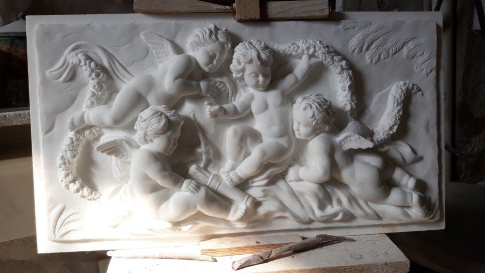bassorilievo putti