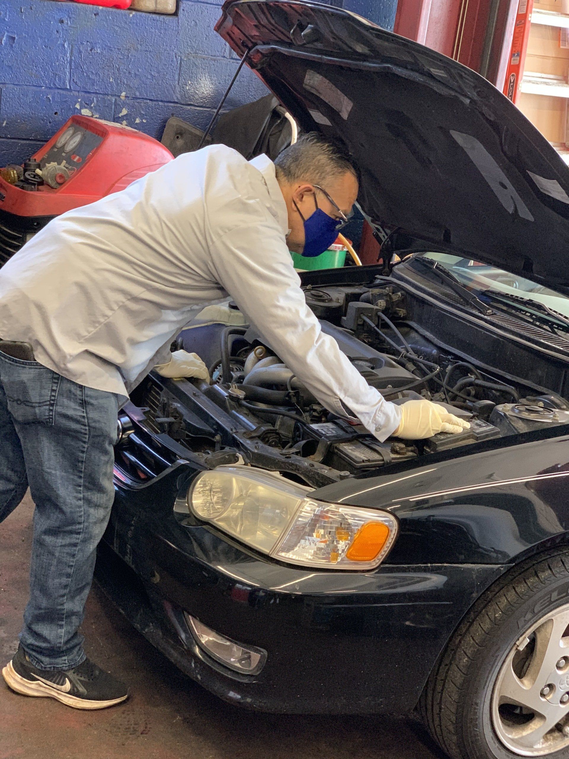 owner working on car