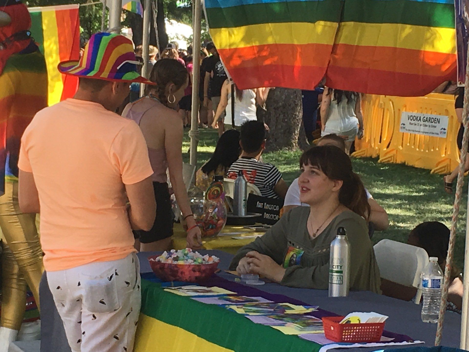 People at an outdoor Pride event.