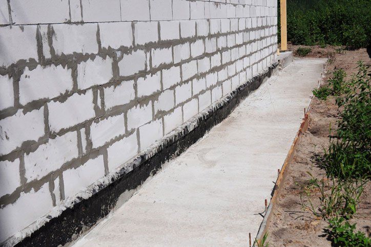 Waterproofed basement bricks
