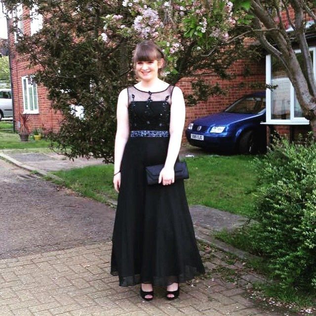 Beautiful lady in black stylish dress