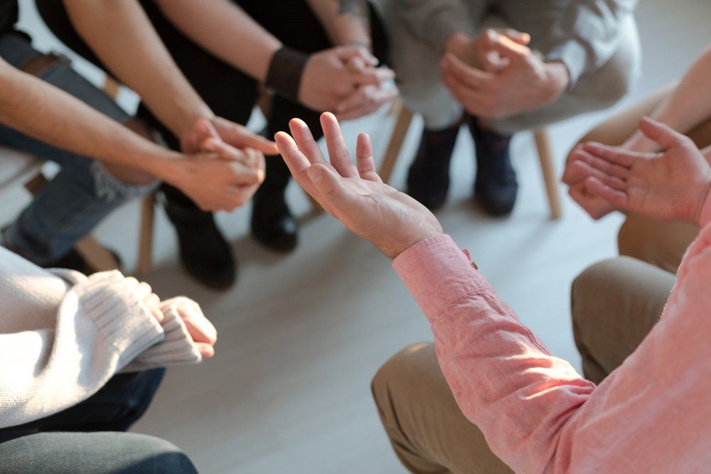 Therapist's Hands Explaining A Problem — Neptune Beach, FL — Jacksonville Center for Grief and Loss