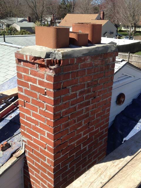 Chimney with Damaged Corner – West Springfield, MA – Rolandini Brothers Masonry