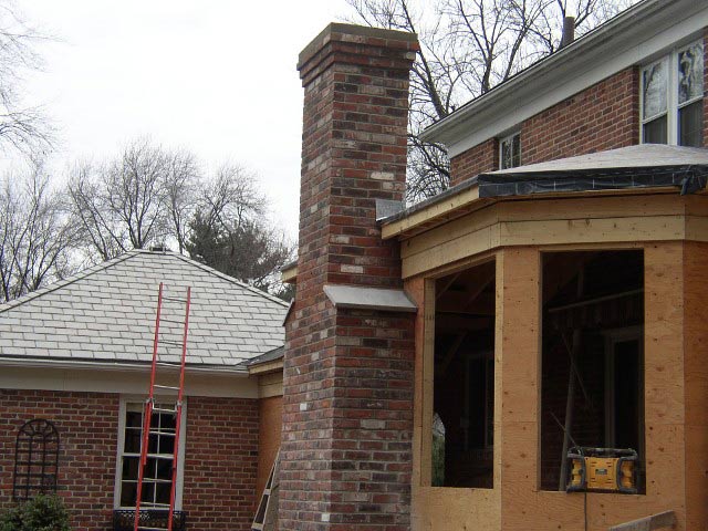 House with Chimney Under Construction – West Springfield, MA – Rolandini Brothers Masonry