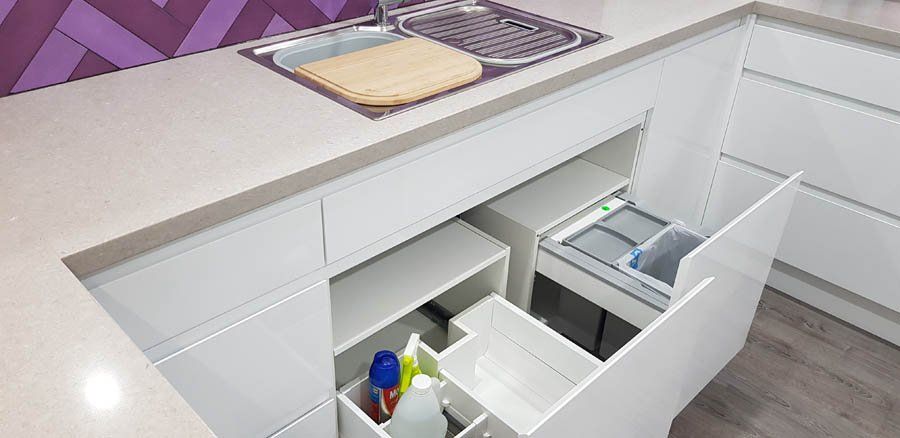 trash can and cleaning supplies