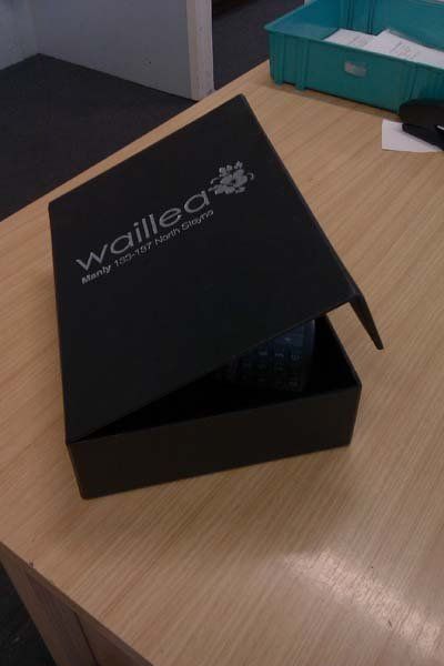 black cover with print partly open