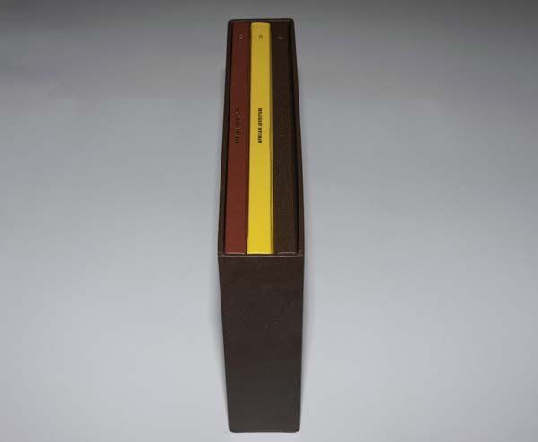 brown book holder on spine
