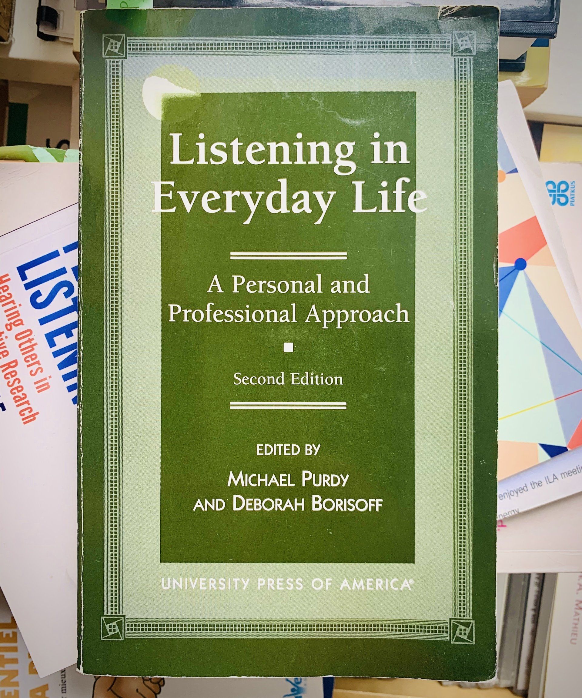 The green cover of the book 