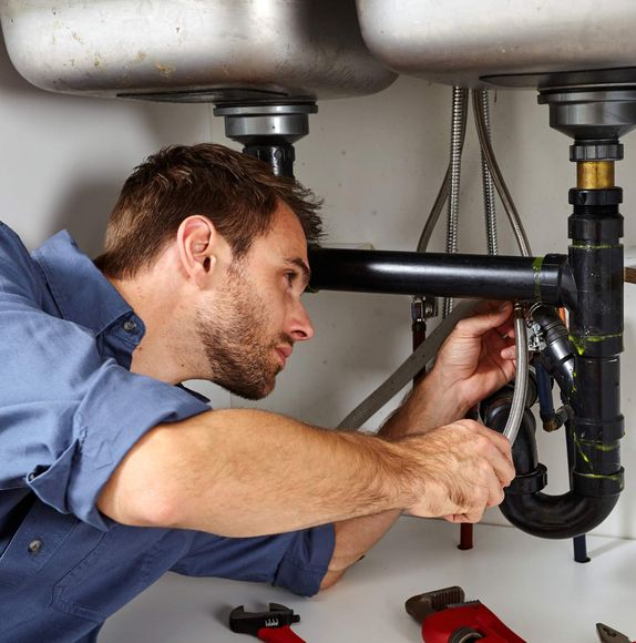 Repairing Kitchen Sink — Mooresville, NC — Thompson Plumbing & Pump Service Inc