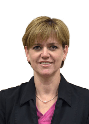 Portrait of a smiling woman in a black blazer and pink top against a white background