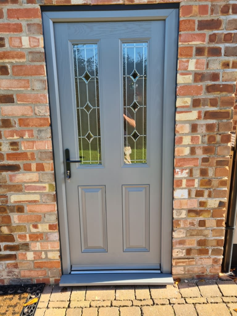 Grey door with 2 window panels